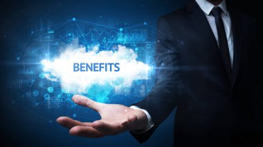 Motivasyon mesajı taşıyan iş adamının eli