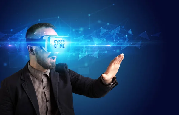 Businessman looking through Virtual Reality glasses, virtual security concept — Stock Photo, Image