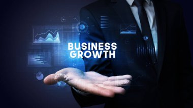 Motivasyon mesajı taşıyan iş adamının eli