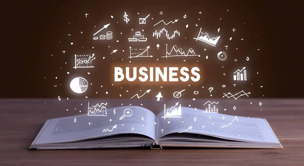 Business inscription coming out from an open book — Stock Photo, Image