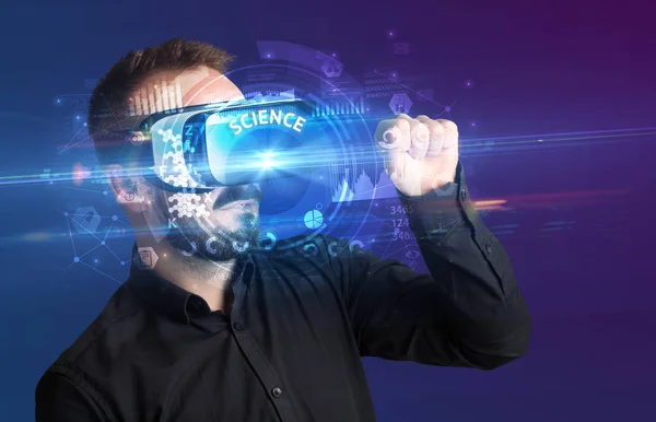 Businessman looking through VR glasses — Stock Photo, Image