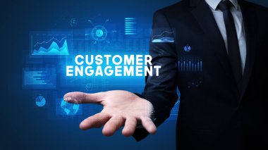 Motivasyon mesajı taşıyan iş adamının eli