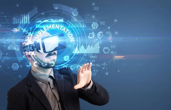 Businessman looking through VR glasses — Stock Photo, Image