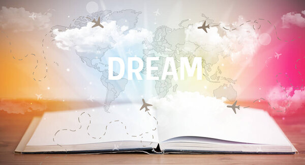 Open book with DREAM inscription, vacation concept