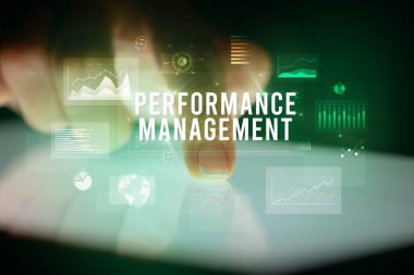 İş grafikleri ve simgeler konseptiyle tablete dokunmak