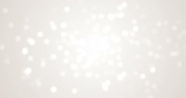 4k beyaz soyut noel arkaplanı bulanıklığı. Gri arka planda kusursuz, hareketli ışıklar. Güzel bir şenlik evi. Xmas satışı simli animasyon. Bokeh parıltısı boş kış Bg