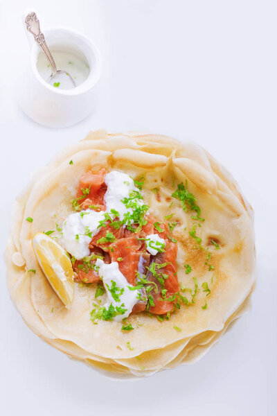 Crepes with smoked salmon.