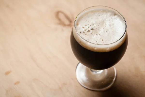 Imperial stout on wood — Stock Photo, Image