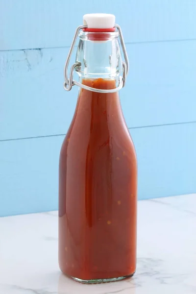Artisan made red hot sauce — Stock Photo, Image