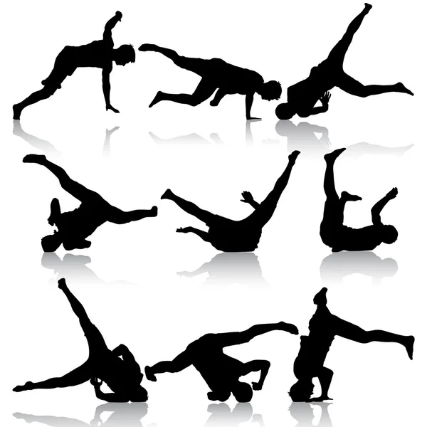 Breakdancer sagome su sfondo bianco. Illustrazione vettoriale — Vettoriale Stock