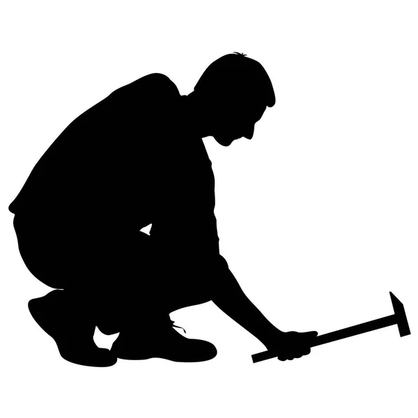 Silhouet man met de hamer op een witte achtergrond, vectorillustratie — Stockvector