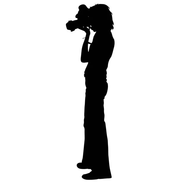 Cameraman with video camera. Silhouettes on white background. Vector illustration — Stock Vector