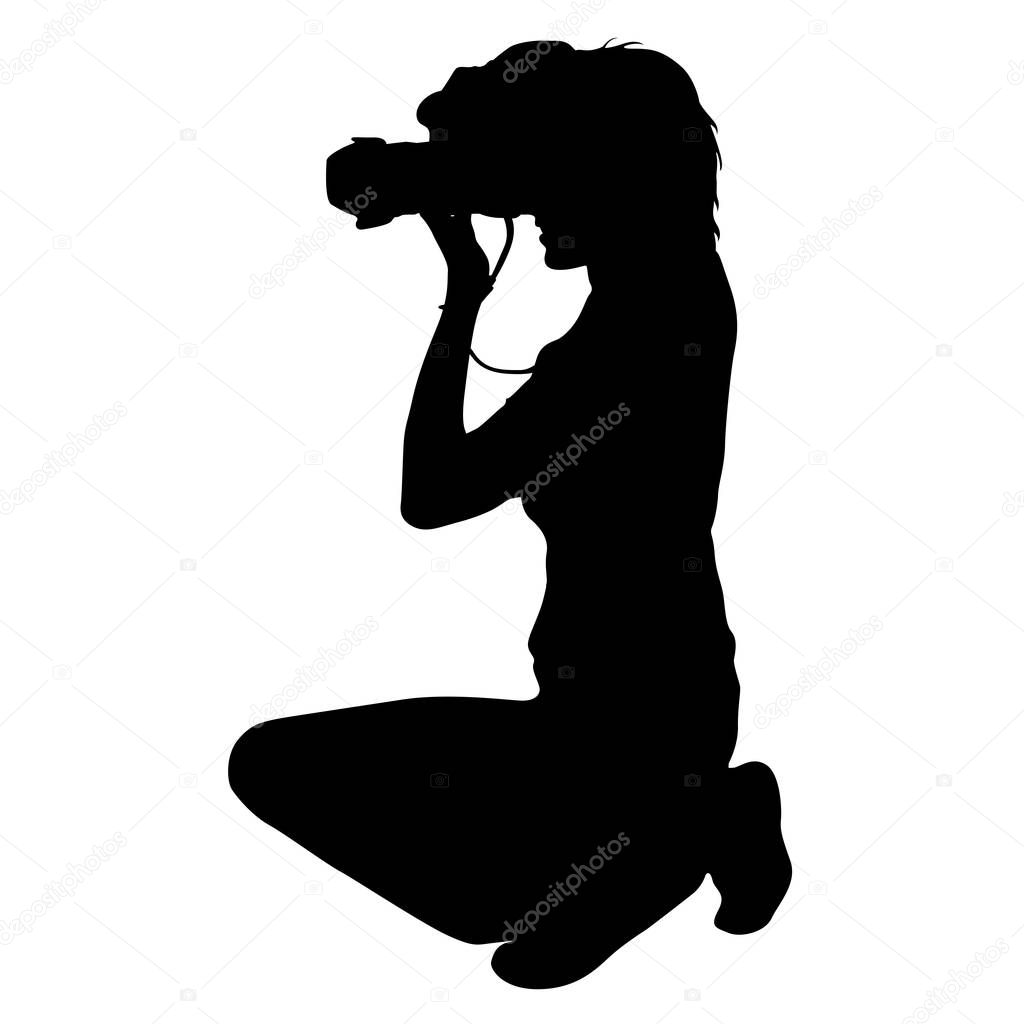 Cameraman with video camera. Silhouettes on white background. Vector illustration