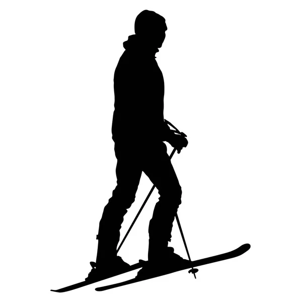 Skier standing on the snow. Vector sport silhouette — Stock Vector