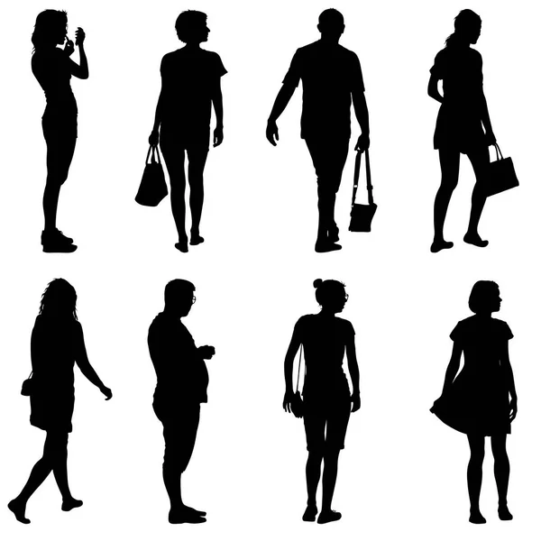 Silhouette noire groupe de personnes debout dans différentes poses — Image vectorielle