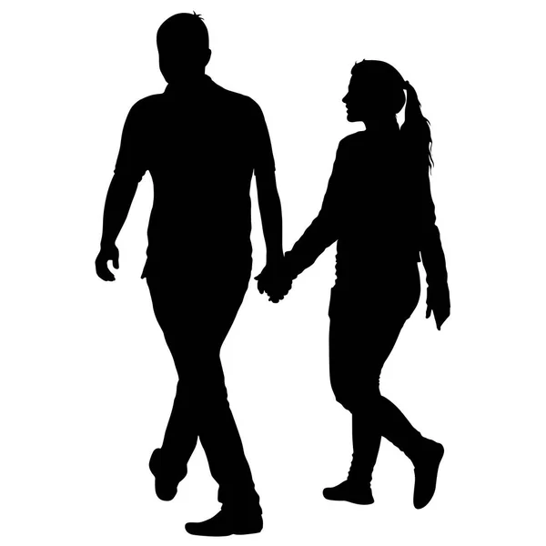 Silhouette homme et femme marchant main dans la main — Image vectorielle
