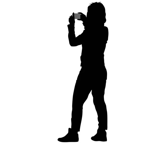 Silhuetas mulher tomando selfie com smartphone no fundo branco — Vetor de Stock