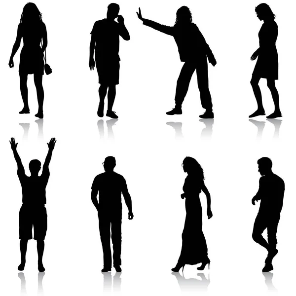 Silhouette noire groupe de personnes debout dans différentes poses — Image vectorielle