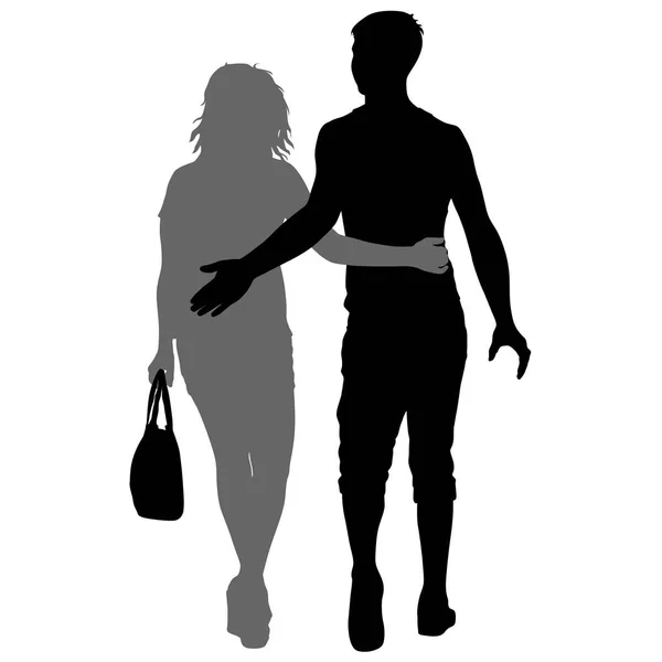 Silhouette homme et femme marchant main dans la main — Image vectorielle