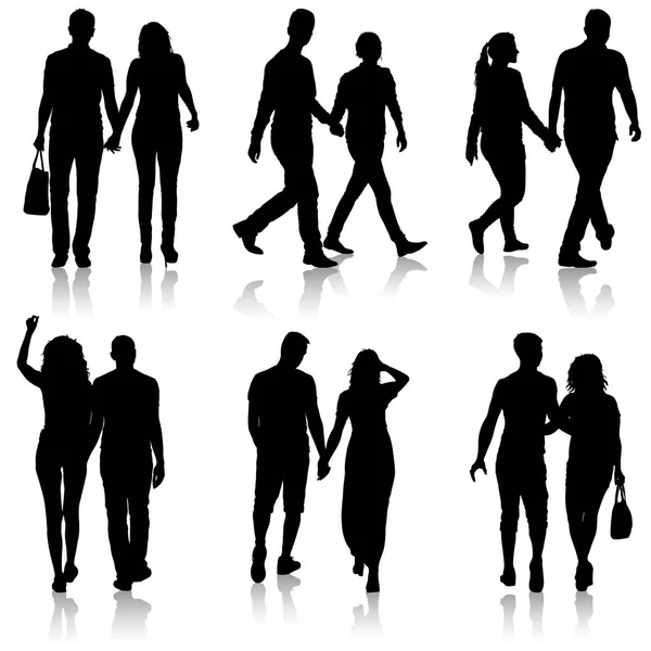 Set Silhouette man and woman walking hand in hand — Stock Vector