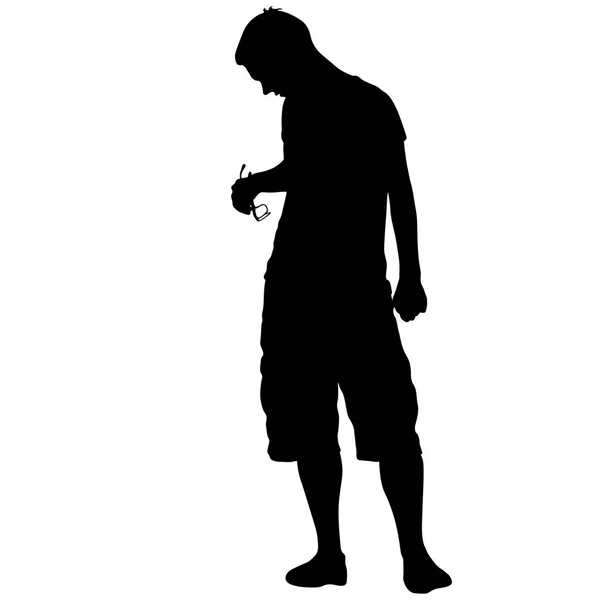 Nero silhouette uomo in piedi, persone su sfondo bianco — Vettoriale Stock