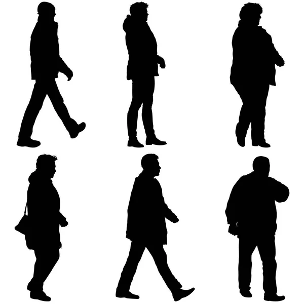 Set silueta de personas caminando sobre fondo blanco — Vector de stock