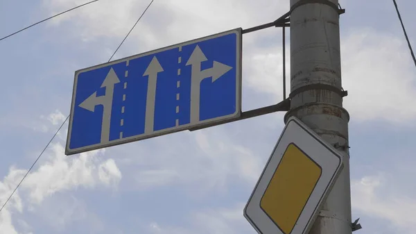 Road signs on a pole, the main road and the prohibition of truck traffic — Stock Photo, Image