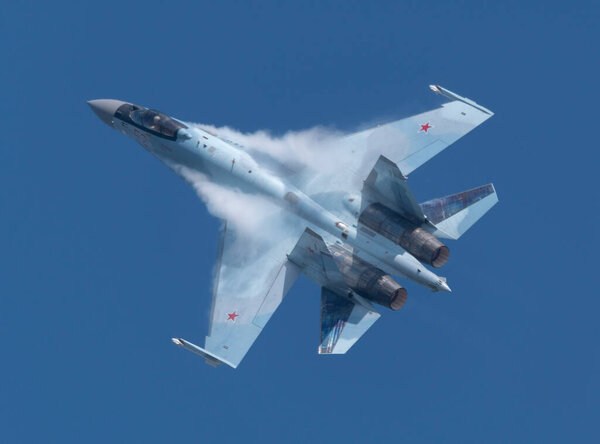 Moscow Russia Zhukovsky Airfield 31 August 2019: aerobatic Su-35 perfoming demonstration flight of the international aerospace salon MAKS-2019.