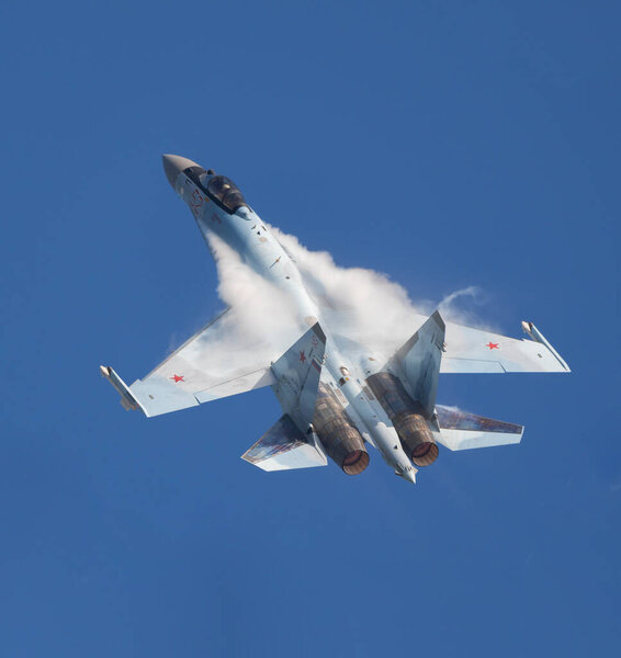 Moscow Russia Zhukovsky Airfield 31 August 2019: aerobatic Su-35 perfoming demonstration flight of the international aerospace salon MAKS-2019.