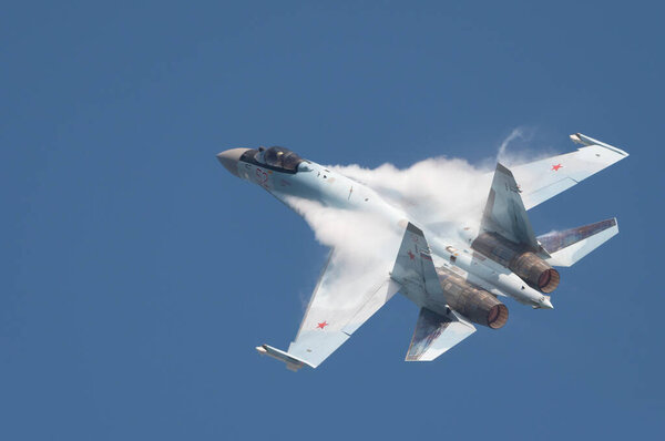 Moscow Russia Zhukovsky Airfield 31 August 2019: aerobatic Su-35 perfoming demonstration flight of the international aerospace salon MAKS-2019.