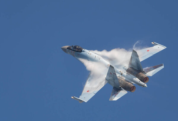 Moscow Russia Zhukovsky Airfield 31 August 2019: aerobatic Su-35 perfoming demonstration flight of the international aerospace salon MAKS-2019.