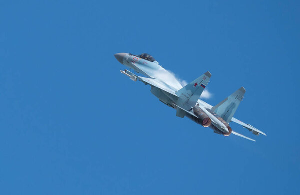 Moscow Russia Zhukovsky Airfield 31 August 2019: aerobatic Su-35 perfoming demonstration flight of the international aerospace salon MAKS-2019.