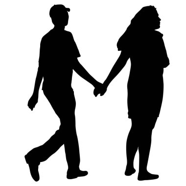 Siluet adam ve kadın el ele yürüyorlar.