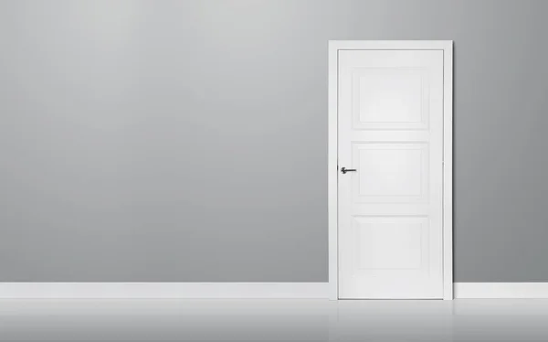 Drewniane drzwi w pustym pokoju — Zdjęcie stockowe
