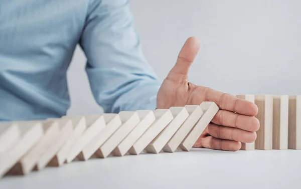Close Businessman Stopping Domino Effect Wooden Blocks Copy Space — Stock Photo, Image