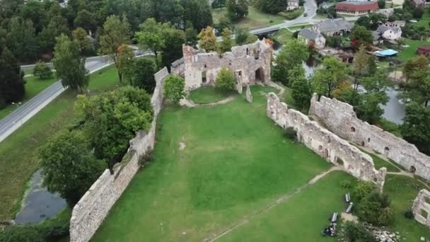 Ruins of an ancient medieval castle Dobele Latvia Aerial drone top view 4K UHD video — Stock Video
