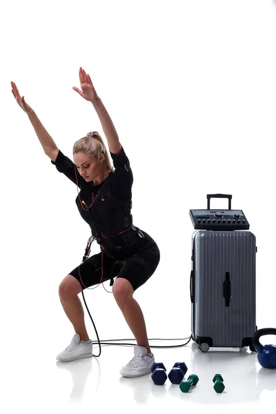 EMS fitness woman doing squats — Stock Photo, Image