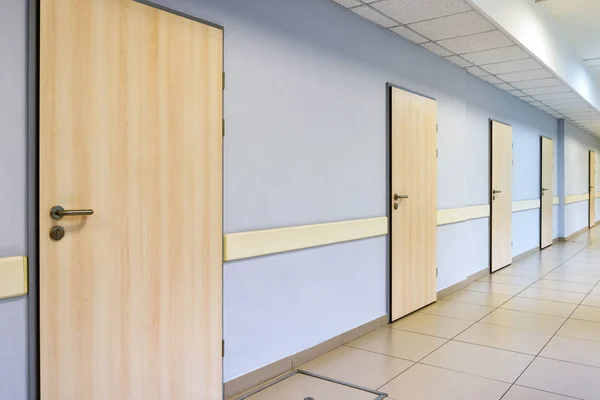 Corridor with many doors — Stock Photo, Image