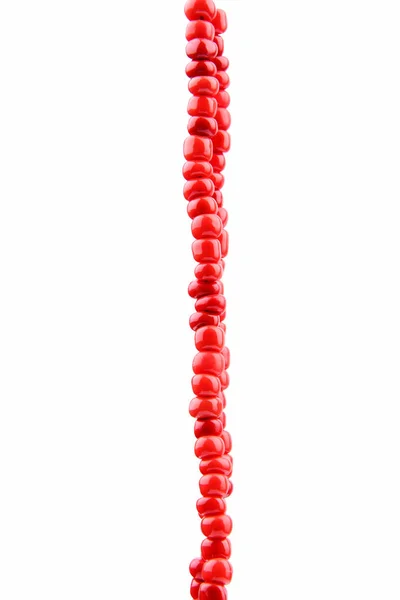 Red beads isolated on white — Stock Photo, Image