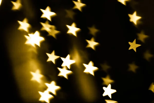 Golden stars bokeh background — Stock Photo, Image