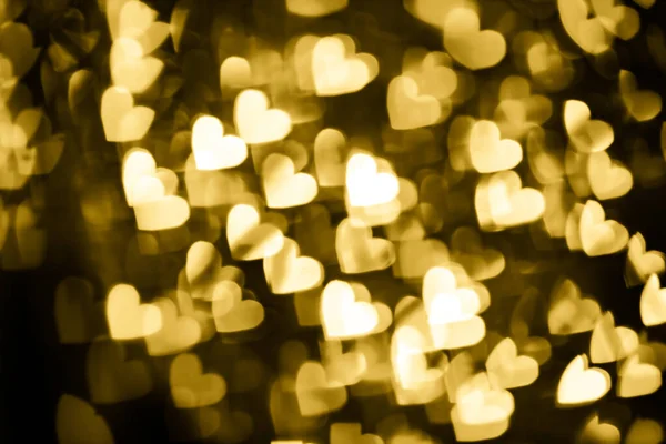 Corazón dorado fondo bokeh — Foto de Stock