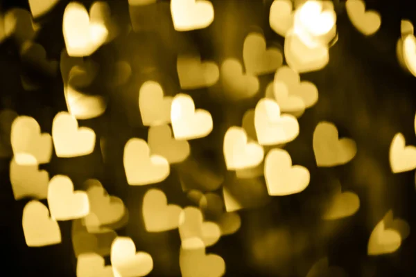 Corazón dorado fondo bokeh — Foto de Stock