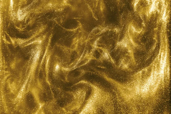 ゴールドキラキラ光る魔法ボケの背景 — ストック写真
