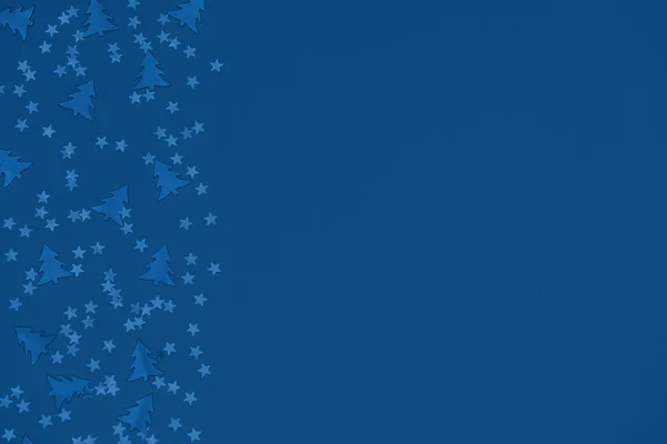 Fémfólia karácsonyfák és csillagok konfetti gyér trend — Stock Fotó