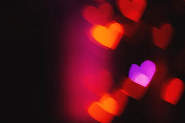 Corazón colorido fondo bokeh — Foto de Stock