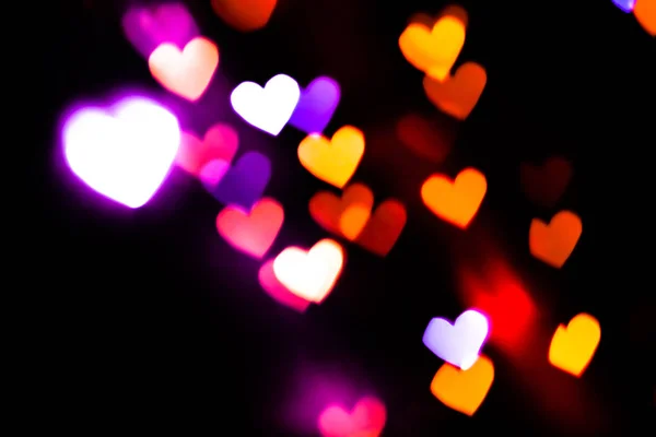 Corazón colorido fondo bokeh — Foto de Stock