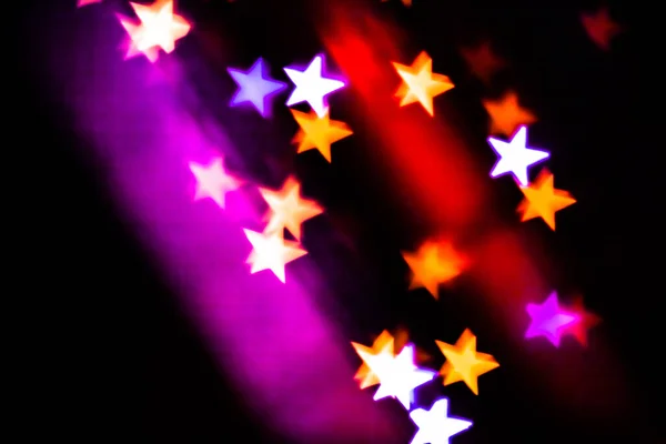 Colorful stars bokeh background — Stock Photo, Image