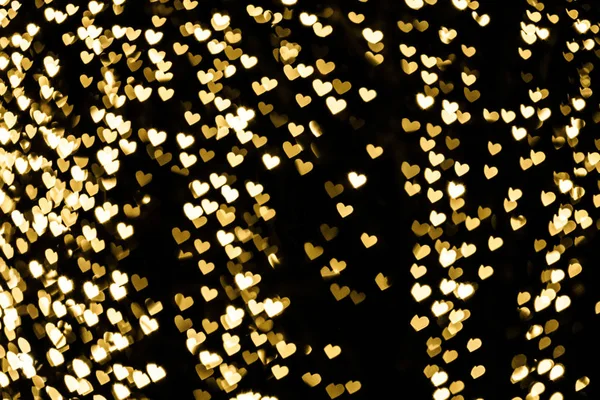 Goldenes Herz Bokeh Hintergrund — Stockfoto