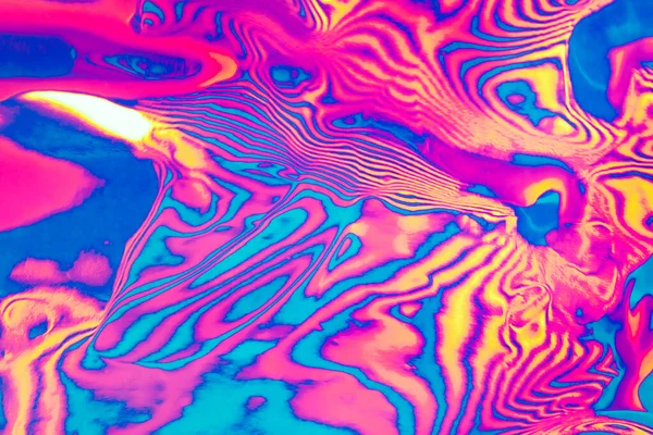 Neon gekleurde psychedelische fluorescerende gestreepte zebra textuur achtergrond — Stockfoto