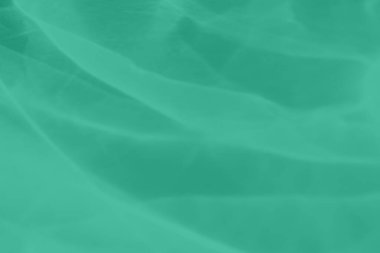 Işık ve gölgeli yakıcı efektli naneli, soyut arkaplan. Işık camdan geçer. 2020 yıllık renk eğilimi